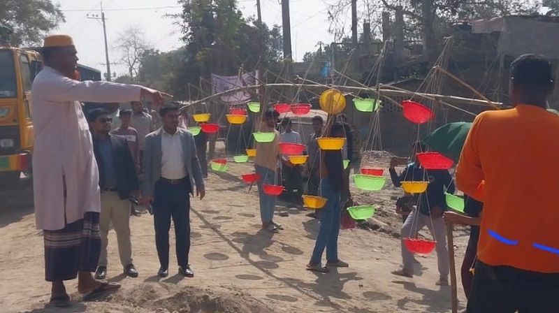 চাঁপাইনবাবগঞ্জে আচরণবিধি লংঘন করে প্রচারণার দাড়িপাল্লা ও ধানের শীষের উঁচু প্রতীক অপসারণ